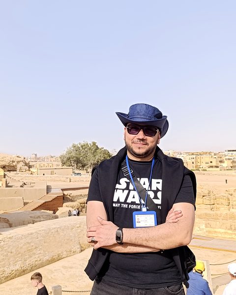 Michael Sabry on the Sphinx terrace with visitors in the background